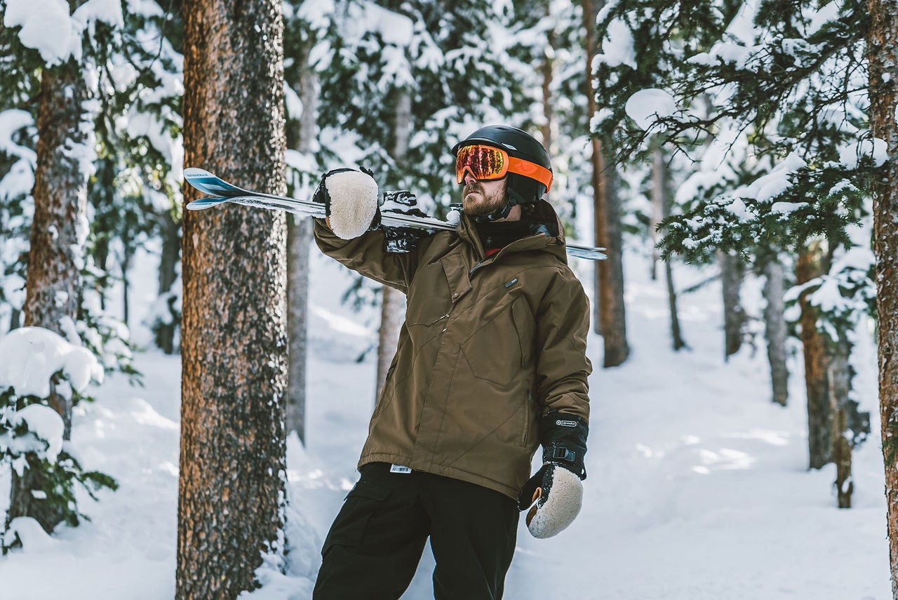 man with skis on Copper Mountain, CO