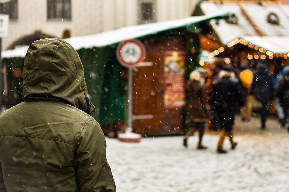 Christmas market with snow coming down