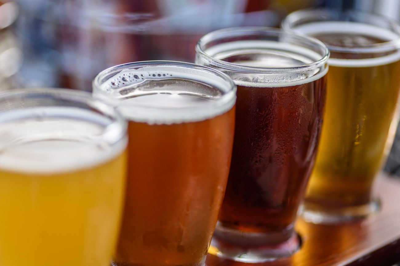 1125087566 Beautiful colorful beer sample glasses at microbrewery