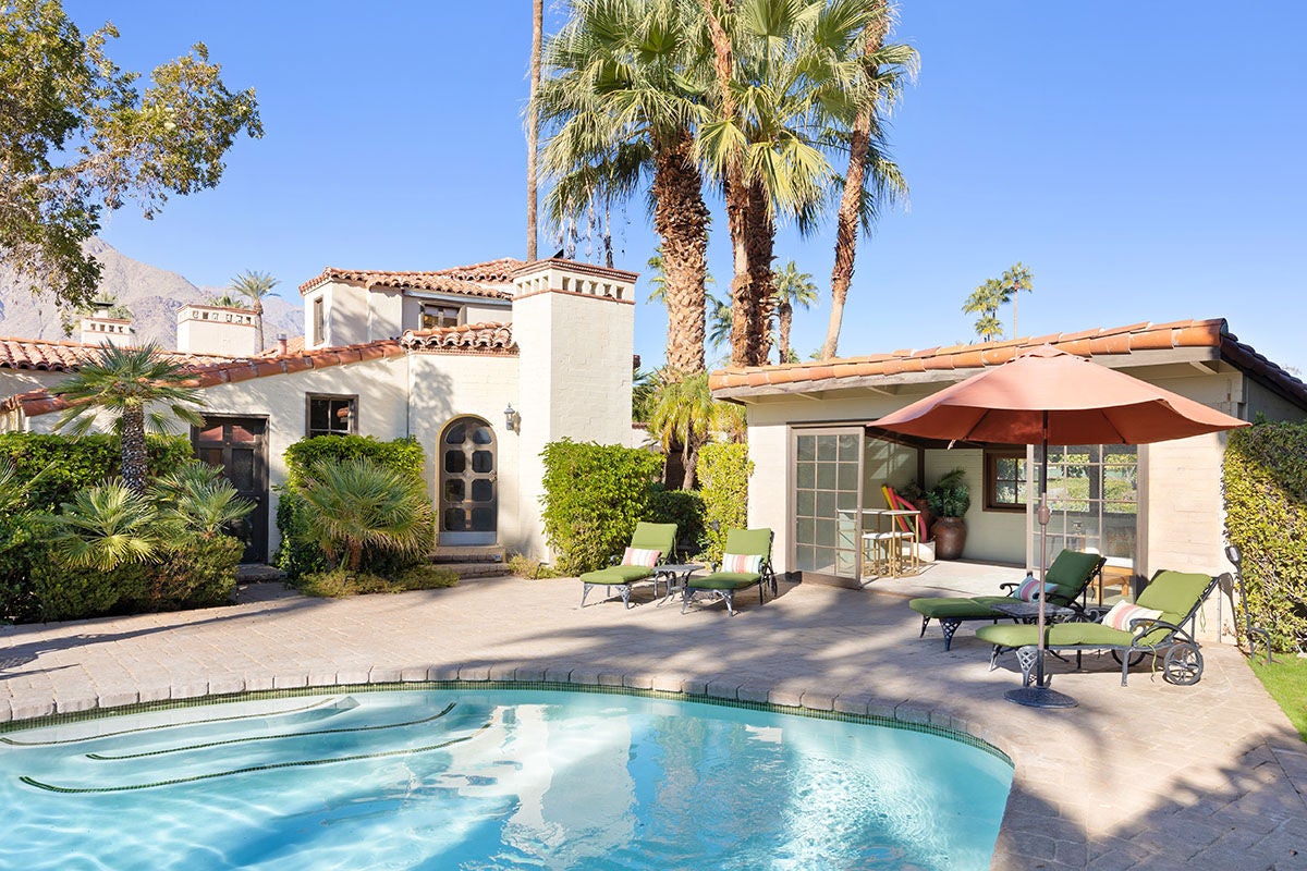 SAND ACRE ESTATES FEATURES AN IN-GROUND POOL AND SITTING SPA WITH AN OVERSIZED PATIO AREA AND POOLSIDE CABANA. THIS HOME PERMITS WEDDINGS AND OTHER EVENTS TOO. [CITY OF PALM SPRINGS ID #199]