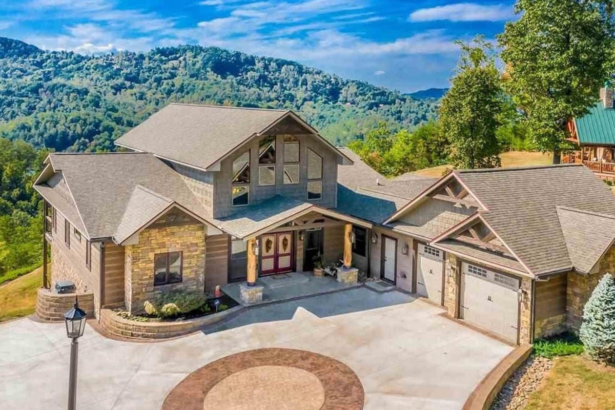 Resting on 2 acres, Buckhaven is a 4-bedroom, 6-bath custom home minutes from Pigeon Forge Parkway.