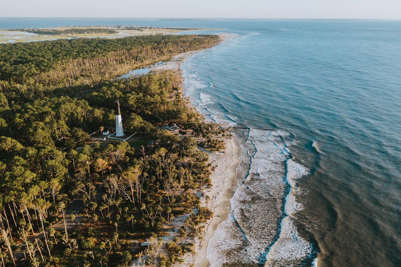 Aerial drone photograph shot of the lighthouse on Hunting Island Beach.