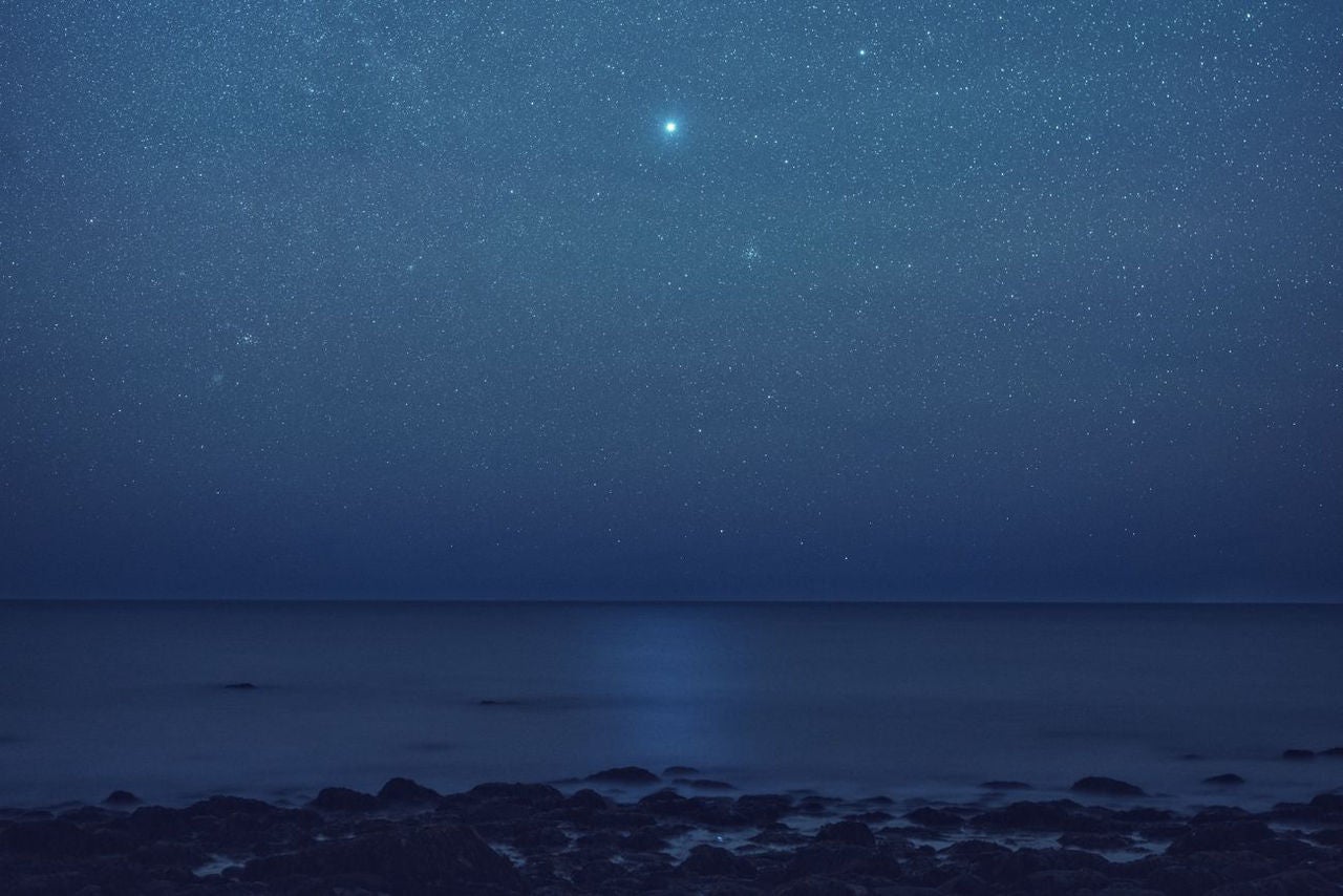 Stars over a beach.