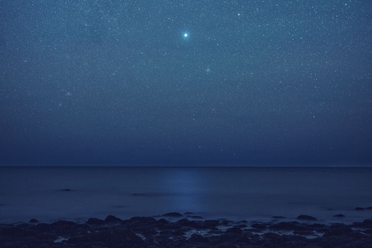 Stars over a beach.