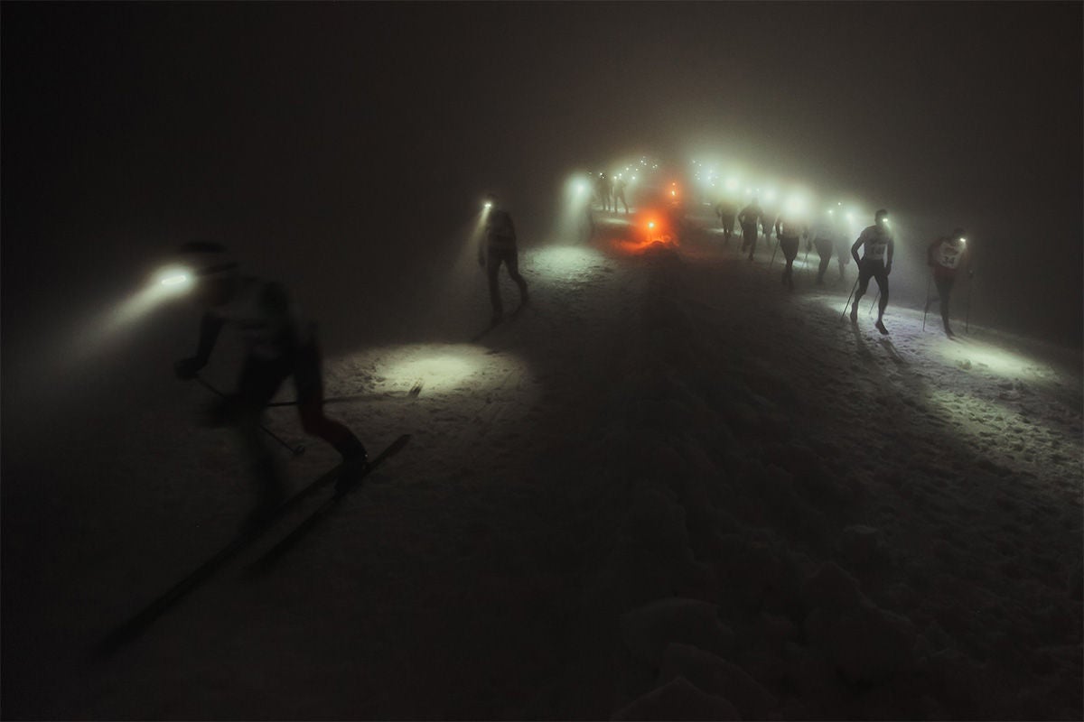 Experience the thrill of headlamp night skiiing.