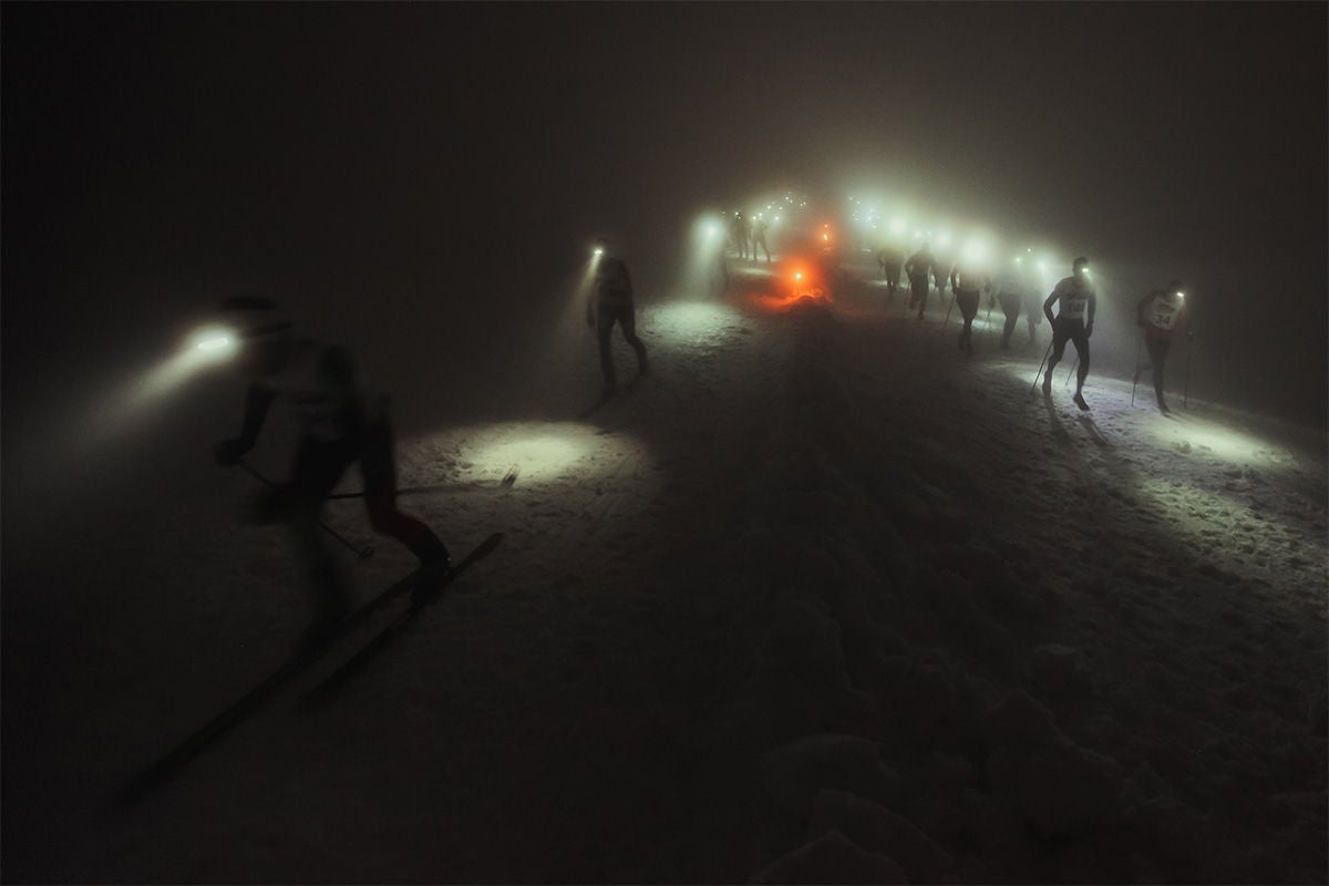 Experience the thrill of headlamp night skiiing.