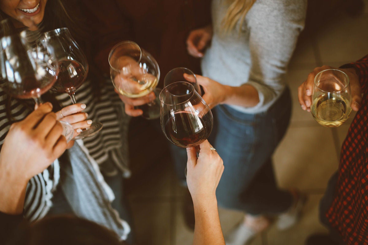 Friends enjoying a glass of wine