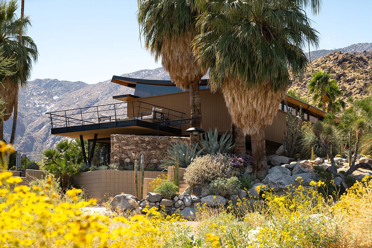 THE HOME ITSELF APPEARS TO EMERGE FROM THE ROCKY BOULDERS ADDING EVEN MORE DRAMATIC VIEWS OF THE COACHELLA VALLEY BELOW. [CITY OF PALM SPRINGS #4398]