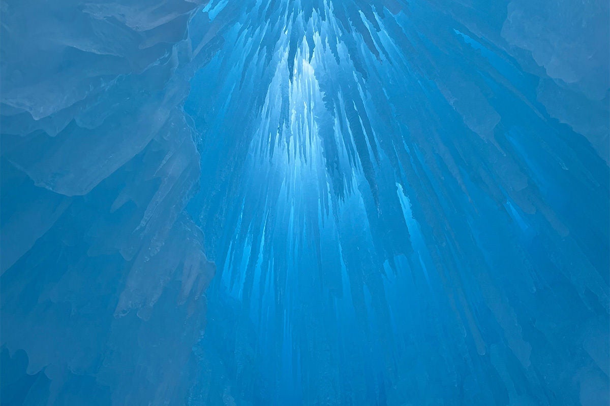 Ice is coming down from the ceiling at the Ice Castles